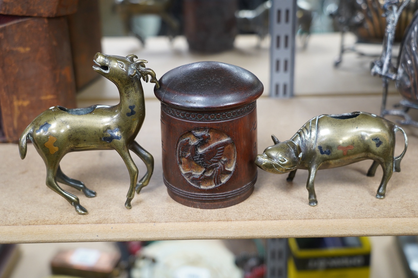 Two 19th century Chinese bronze, copper and silver inlaid censers in the form of animals and a bamboo tea caddy, largest 14cm high. Condition - fair